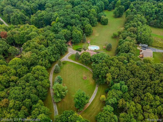 9601 Kier Rd, Holly, MI 48442 - aerial view of property's location with a heavily wooded area