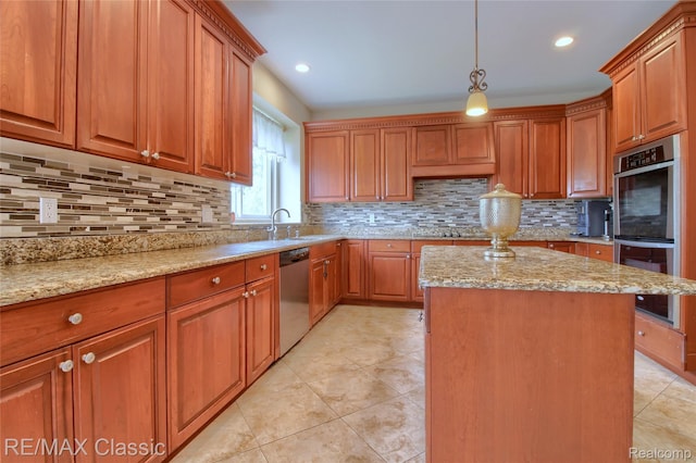 761 Nissen Ct, Wixom, MI 48393 - kitchen with stainless steel appliances, a kitchen island, light stone countertops, brown cabinetry, and tasteful backsplash