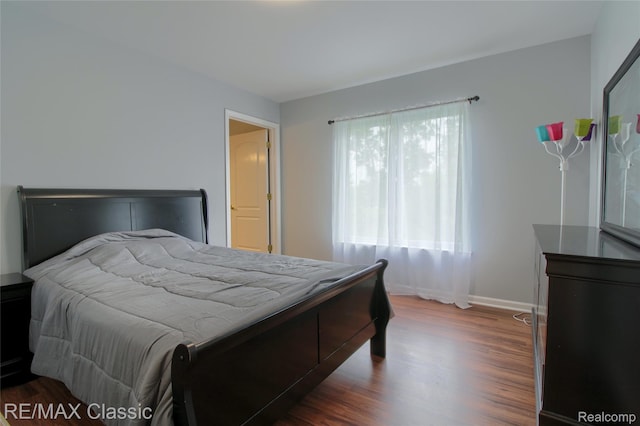 761 Nissen Ct, Wixom, MI 48393 - bedroom with wood finished floors and baseboards