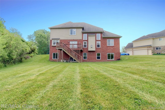 761 Nissen Ct, Wixom, MI 48393 - rear view of property with stairs, brick siding, a wooden deck, and a lawn