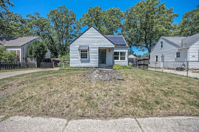 237 Holly St, Wyoming, MI 49548 - bungalow-style house with roof mounted solar panels