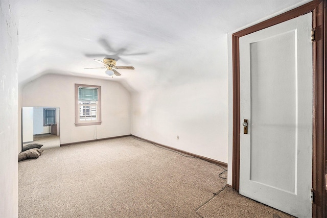 237 Holly St, Wyoming, MI 49548 - bonus room featuring ceiling fan, light colored carpet, and vaulted ceiling
