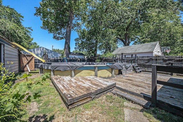 237 Holly St, Wyoming, MI 49548 - wooden terrace featuring a fenced backyard