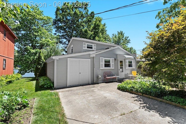 1500 Clark Lake Rd, Brighton, MI 48114 - view of front of home featuring a front lawn and a patio