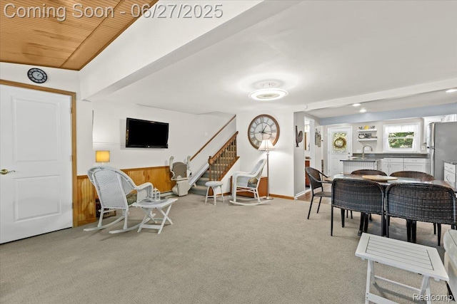 1500 Clark Lake Rd, Brighton, MI 48114 - carpeted living room with stairway and a sink