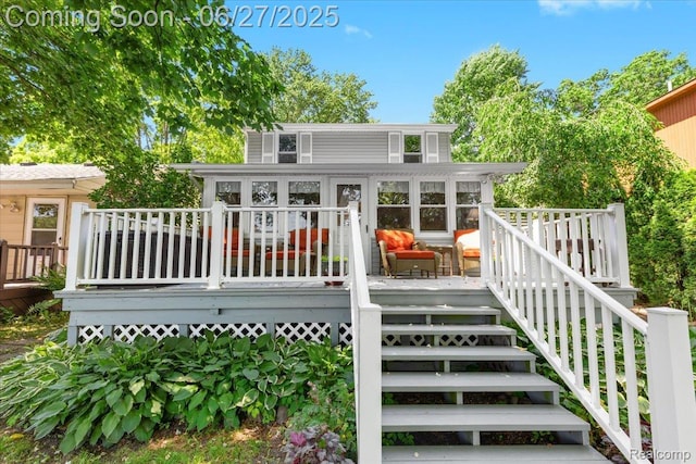 1500 Clark Lake Rd, Brighton, MI 48114 - back of property featuring a wooden deck and stairs