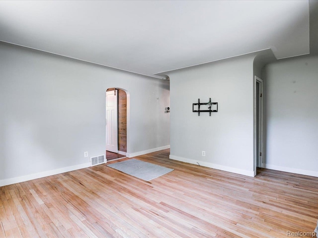 3107 Stone St, Port Huron, MI 48060 - unfurnished room featuring arched walkways and wood finished floors
