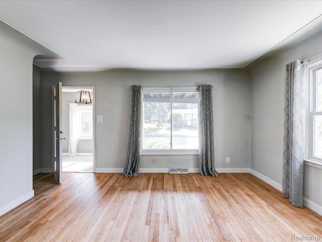 3107 Stone St, Port Huron, MI 48060 - empty room with light wood-style floors and plenty of natural light