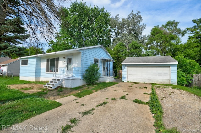 1413 Martha Ave, Burton, MI 48509 - ranch-style home with an outbuilding and a garage