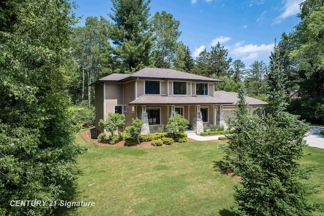 2985 E Iron Woods Pass, Midland, MI 48642 - view of front of property with a porch, a front lawn, a garage, and driveway