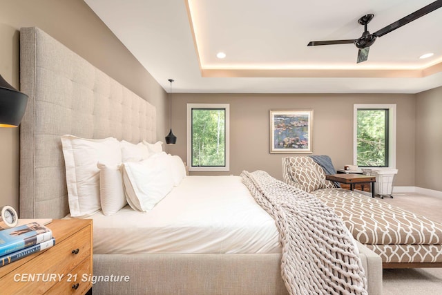 2985 E Iron Woods Pass, Midland, MI 48642 - bedroom with a raised ceiling, recessed lighting, and ceiling fan