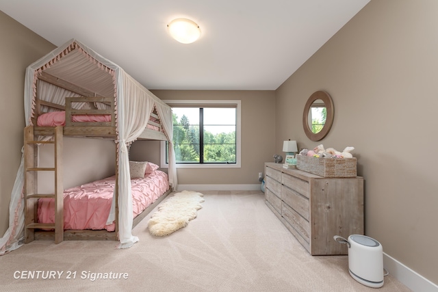 2985 E Iron Woods Pass, Midland, MI 48642 - bedroom featuring baseboards and carpet