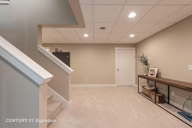 2985 E Iron Woods Pass, Midland, MI 48642 - interior space featuring light colored carpet, recessed lighting, a paneled ceiling, and stairs