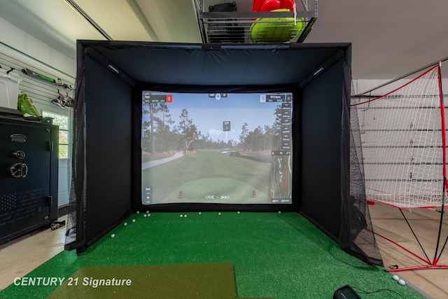 2985 E Iron Woods Pass, Midland, MI 48642 - playroom with golf simulator and carpet floors