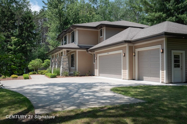 2985 E Iron Woods Pass, Midland, MI 48642 - view of front facade with an attached garage, driveway, and roof with shingles