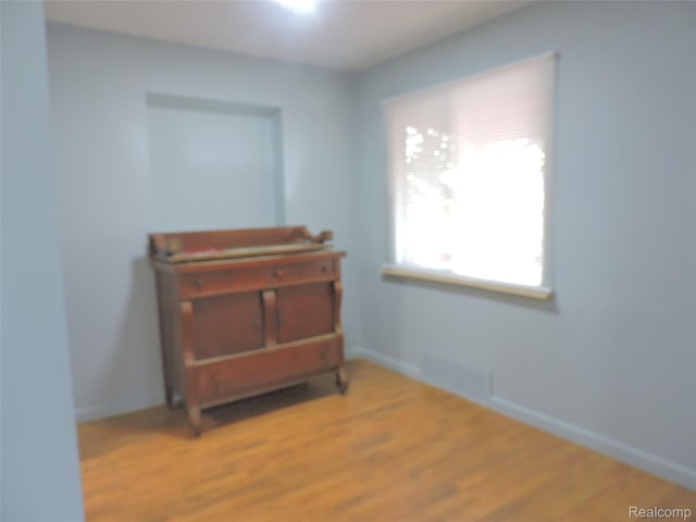 239 W Cornell Ave, Pontiac, MI 48340 - corridor featuring baseboards and wood finished floors