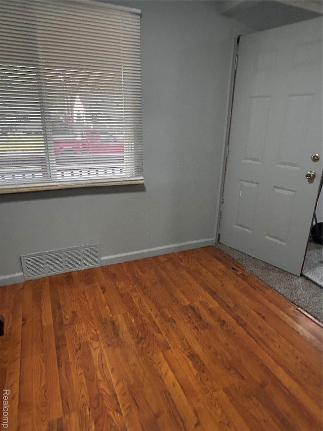 239 W Cornell Ave, Pontiac, MI 48340 - spare room featuring wood finished floors and baseboards