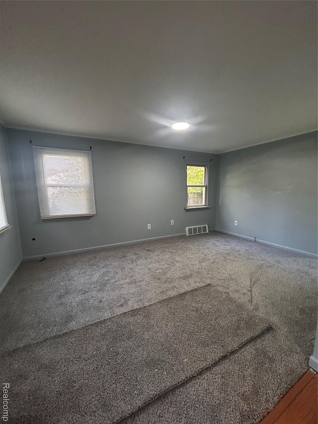 239 W Cornell Ave, Pontiac, MI 48340 - carpeted spare room with baseboards