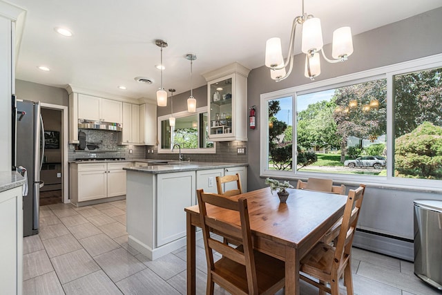 2507 Riverwood Ter, Saint Joseph, MI 49085 - dining space with plenty of natural light, a chandelier, and recessed lighting