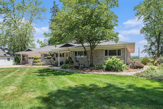 2507 Riverwood Ter, Saint Joseph, MI 49085 - ranch-style home featuring a garage and a front lawn