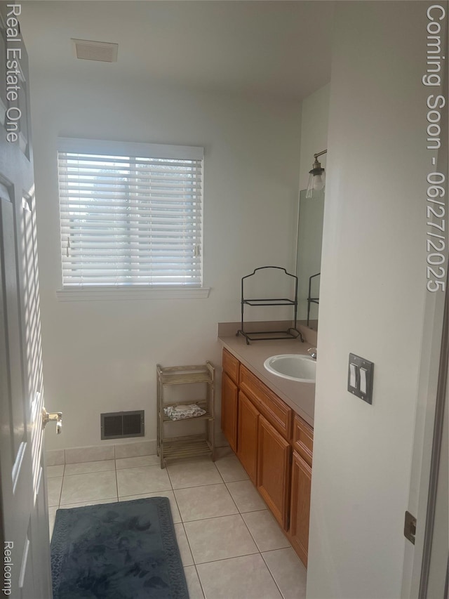 36339 Cecilia Dr, Sterling Heights, MI 48312 - bathroom with vanity and tile patterned flooring