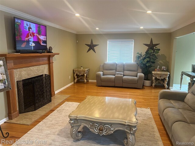 36339 Cecilia Dr, Sterling Heights, MI 48312 - living area featuring crown molding, wood finished floors, recessed lighting, and a high end fireplace