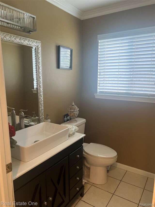 36339 Cecilia Dr, Sterling Heights, MI 48312 - half bathroom with tile patterned flooring, vanity, and ornamental molding