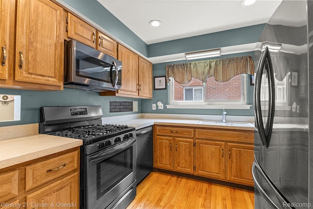17276 Midway Ave, Allen Park, MI 48101 - kitchen featuring stainless steel appliances, brown cabinets, light countertops, and recessed lighting