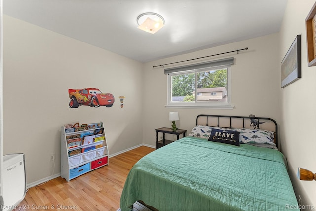 17276 Midway Ave, Allen Park, MI 48101 - bedroom featuring light wood-type flooring and baseboards
