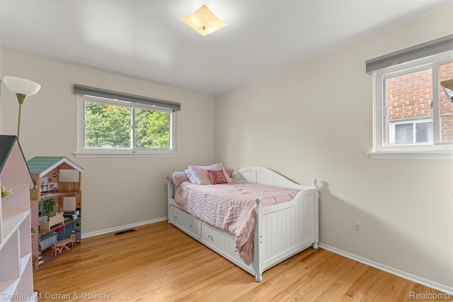 17276 Midway Ave, Allen Park, MI 48101 - bedroom with light wood-style floors and baseboards
