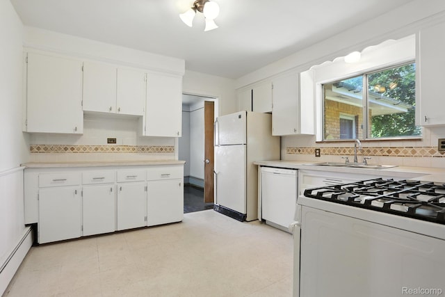 45411 Sterritt St, Utica, MI 48317 - kitchen with white appliances, a baseboard heating unit, light countertops, and white cabinets