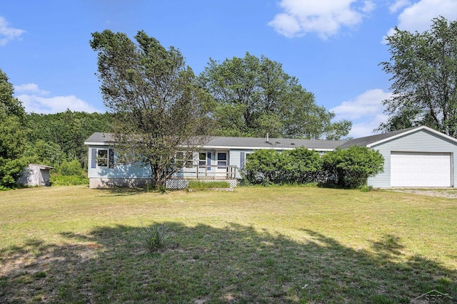 11816 Morton Rd, Manistee, MI 49660 - single story home with a front yard and an attached garage