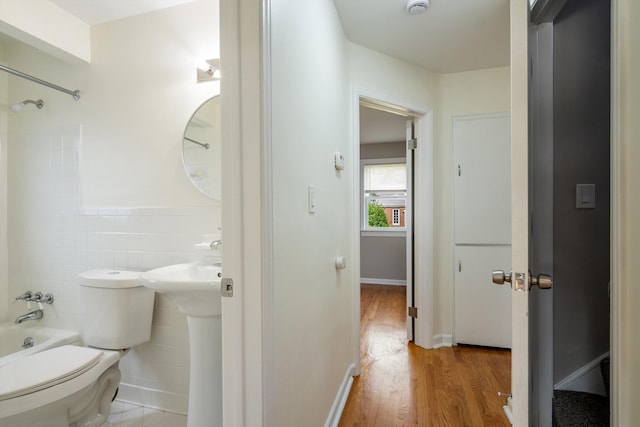 9250 Rosedale Blvd, Allen Park, MI 48101 - full bath with wood finished floors, shower / bathtub combination, and tile walls