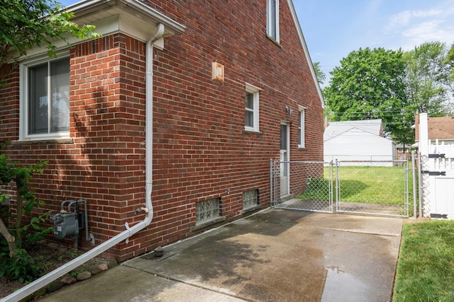 9250 Rosedale Blvd, Allen Park, MI 48101 - view of side of home with a gate and brick siding