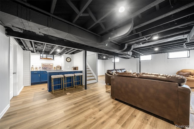 2195 Pembroke Rd, Birmingham, MI 48009 - basement with light wood finished floors and stairs