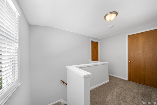 2195 Pembroke Rd, Birmingham, MI 48009 - hallway with an upstairs landing and carpet
