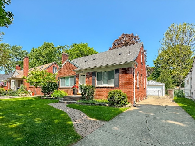 2195 Pembroke Rd, Birmingham, MI 48009 - bungalow with brick siding, an outbuilding, a front yard, a garage, and roof with shingles