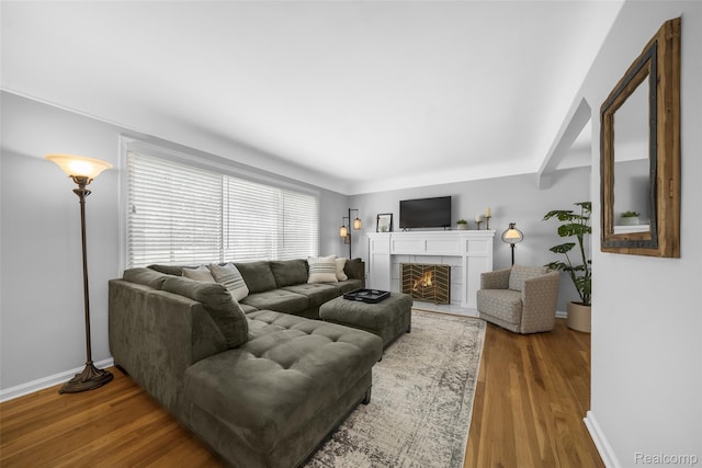 2195 Pembroke Rd, Birmingham, MI 48009 - living area with wood finished floors and a tile fireplace