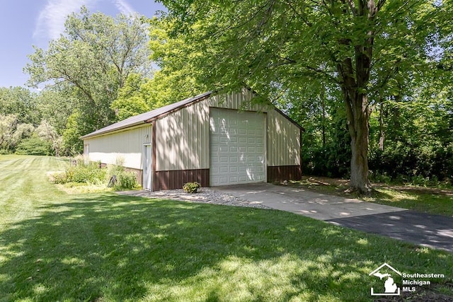 7007 Jackman Rd, Temperance, MI 48182 - view of outdoor structure featuring driveway