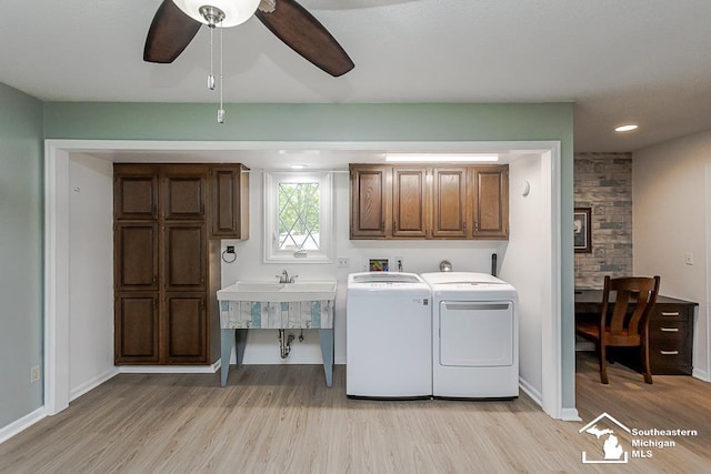 7007 Jackman Rd, Temperance, MI 48182 - laundry area with cabinet space, washing machine and dryer, light wood finished floors, a ceiling fan, and recessed lighting