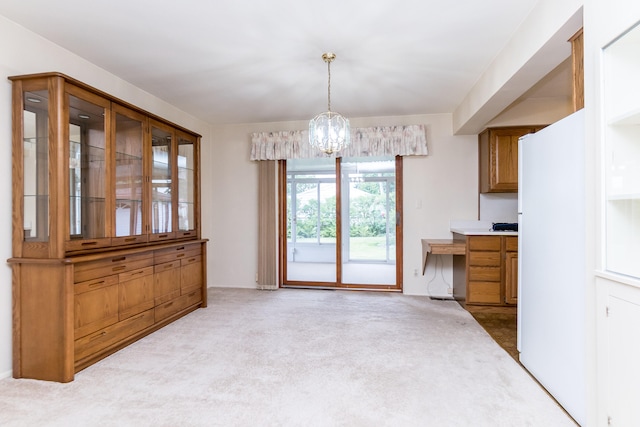 36067 Rolf St, Westland, MI 48186 - unfurnished dining area featuring carpet flooring and a chandelier