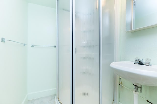 36067 Rolf St, Westland, MI 48186 - bathroom with a shower stall and baseboards