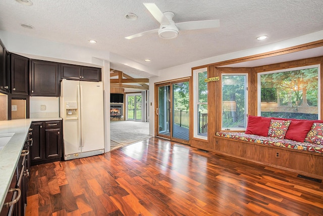3536 Tamsin Ave, Kalamazoo, MI 49008 - kitchen featuring white refrigerator with ice dispenser, wood finished floors, a ceiling fan, a textured ceiling, and recessed lighting