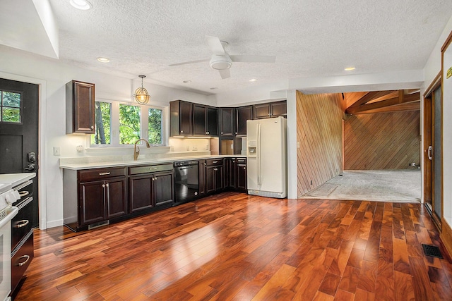 3536 Tamsin Ave, Kalamazoo, MI 49008 - kitchen with white fridge with ice dispenser, dishwasher, light countertops, a textured ceiling, and a ceiling fan