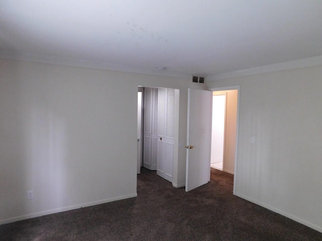 448 Fox Hills Dr S Unit 3, Bloomfield Hills, MI 48304 - carpeted empty room with baseboards