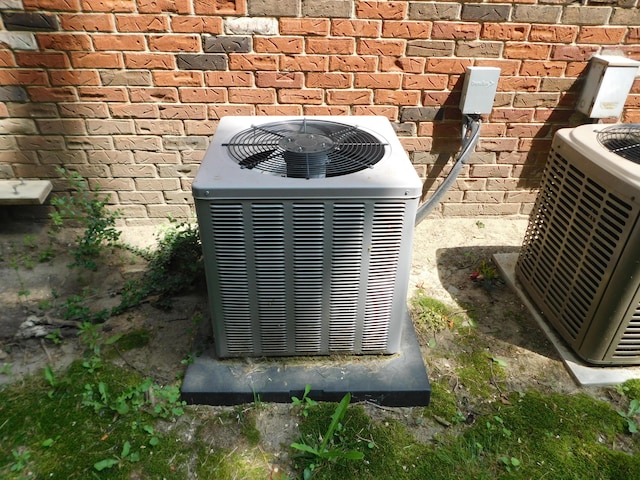 448 Fox Hills Dr S Unit 3, Bloomfield Hills, MI 48304 - exterior view of a central AC unit