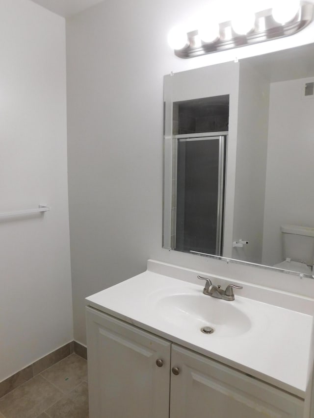 448 Fox Hills Dr S Unit 3, Bloomfield Hills, MI 48304 - full bathroom featuring vanity, a stall shower, and tile patterned floors