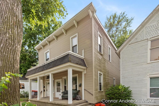 1523 Broadway Ave NW, Grand Rapids, MI 49504 - view of front of property featuring a porch and roof with shingles