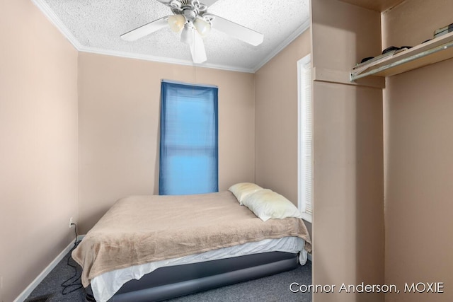 1523 Broadway Ave NW, Grand Rapids, MI 49504 - carpeted bedroom featuring crown molding, a textured ceiling, and a ceiling fan