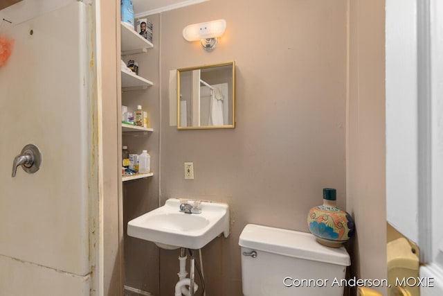 1523 Broadway Ave NW, Grand Rapids, MI 49504 - bathroom featuring toilet and a sink